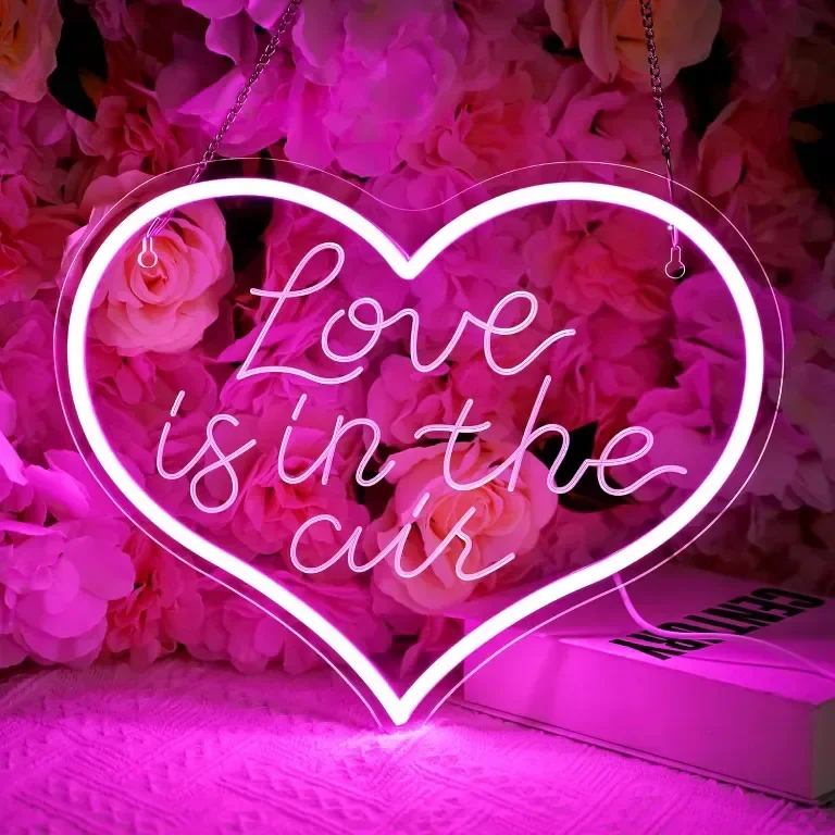 Неонова LED табела с розова светлина, 3D гравирана Love is in Air, 30х35 см