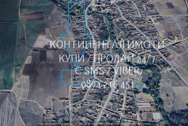 Код 63059. Дворно място 1600м2, с партиди за ток и вода, до ФЕЦове, близо да централния път в селото